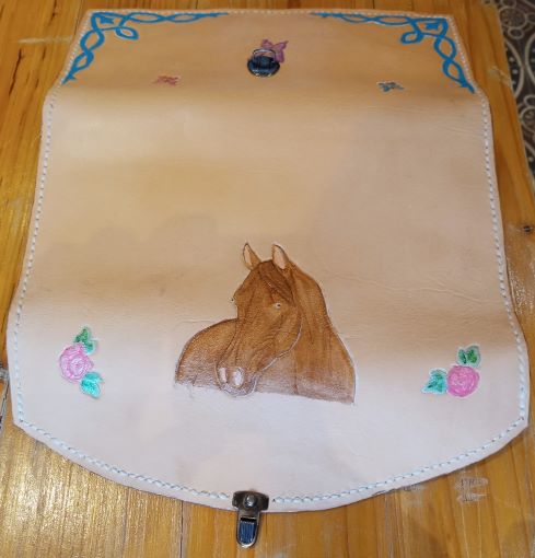 portefeuille en cuir décoré en relief de Valérie